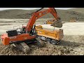 DEVELON DX530LC Excavator Trucks Loading