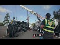 Box Truck Full of Tires Flips Over on Freeway