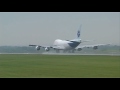Boeing 747-200F wet runway take off close up - Manchester UK