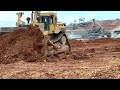 Caterpillar D11R Bulldozer Clears Stockpiles