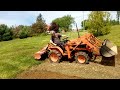 Kubota B6200, tilling the garden.