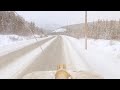 Car falling out of sky infront of loader