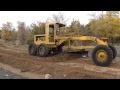 CAT 12 Motorgrader Blade Work