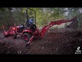 9 year old son running a kubota backhoe.