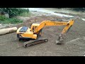 Hyundai 220 Excavator Working In Asian Highway Road Construction / Mountain Rock/ Excavator video