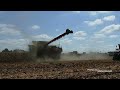 Case IH AF10 Combine with 16-row Corn Head harvesting corn at Farm Progress Show 2024