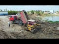 Great Landfilling Up the land Huge by KOMATSU D31P Bulldozer & dumping truck 5ton Unloading, Mix VDO