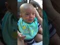 sweet happy baby cooing at mommy and learning how to talk