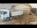 Work of dump truck and Excavator cat 320gx