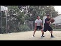 My two brothers playing a friendly basketball game.