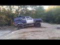 XJ Cherokee attacking a small hill - and getting stuck