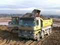 CAT 963C loading topsoil