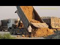 ឡានយីឌុបចាក់ដីធ្វើផ្លូវ Hyundai dump truck unloading dirt and road construction