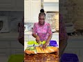 Making a loaded deli sandwich on toasted French bread for my children