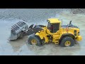 RC MACHINES WORK IN THE MUD! COOL RC DAY IN THE RAIN! BIG VEHICLES WORK IN THE SLUSH AND WATER