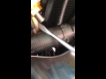 How to adjust cam chain tensioner on BMW s1000rr to eliminate rattle at startup