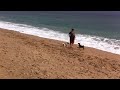 Cally plays ball on the beach