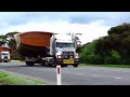 🚛. Two Mack Titans, hauling 2 'tubs' east on Great Eastern Highway, for SMS Mining Services.