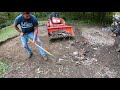 Kubota BX- Digging a pad for a shed with the FEL