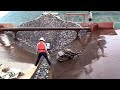 Barge unloading 3500 tons of cobblestone - my day job on the barge