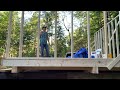 Putting Up A Shed Wall in the Woods