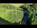 Loch Leven, Sluice gatehouse, Lodges, and sunset 4k Dji Drone view