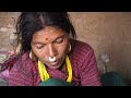 dharme brother's wife cooks potato curry and bread @ruralnepall