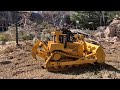 Impressive push power. Wide track Dxr2 rc dozer on rc road construction.