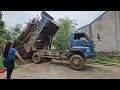 the car go to the high mountains to carry firewood for the farmers.