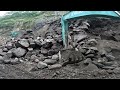 The sand cliff collapsed several times when the excavator dug up the sand