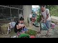 The girl catches fish and picks wild vegetables to sell for a living with her daughter