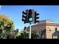 Traffic lights and a broken speaker on one of the pedestrian signals (El Camino Real & The Americna)