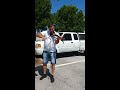Guy Playing The Violin Outside Publix's Food Store Parking lot
