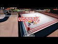 Playing Boxing League Roblox.