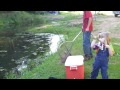 little girl catches big fish