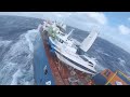 Helicopter Rescue operation for Dutch Cargo ship Eemslift Hendrika in rough sea at Norwegian Sea.