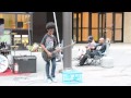 Black kid playing heavy metal music on guitar in New York