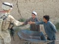 Afghani Boys Give A Marine A Ride