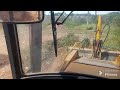 Retroescavadeira Randon trabalhando no lixão.Randon backhoe loader working #