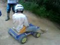 Me riding down the big hill on the power wheels