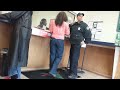 How To Get Arrested, Lady gets arrested for check fraud at a check cashing store.