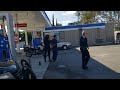 man being arrested at the Mobil gas station Crenshaw in Washington