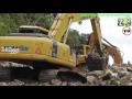 Large Excavator Working On Road Construction