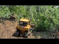 CAT D6R XL Bulldozer Cuts New Road in Mountains During Heavy Rain