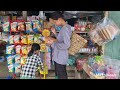 Two sisters harvest bamboo shoots to sell at the market _ as a place for ducks to bathe