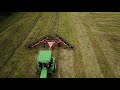 Raking hay with a John Deere 5320