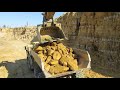 Komatsu PC1250 loading HM400