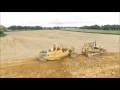 CAT D6D pulling scraper