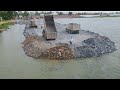 The Numerous Dumper truck Nice Activities Puoring Rock In Deep Water With Wheel Loader Moved Stone