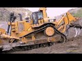 Cat D11T Dozer Rips and Pushes Soil